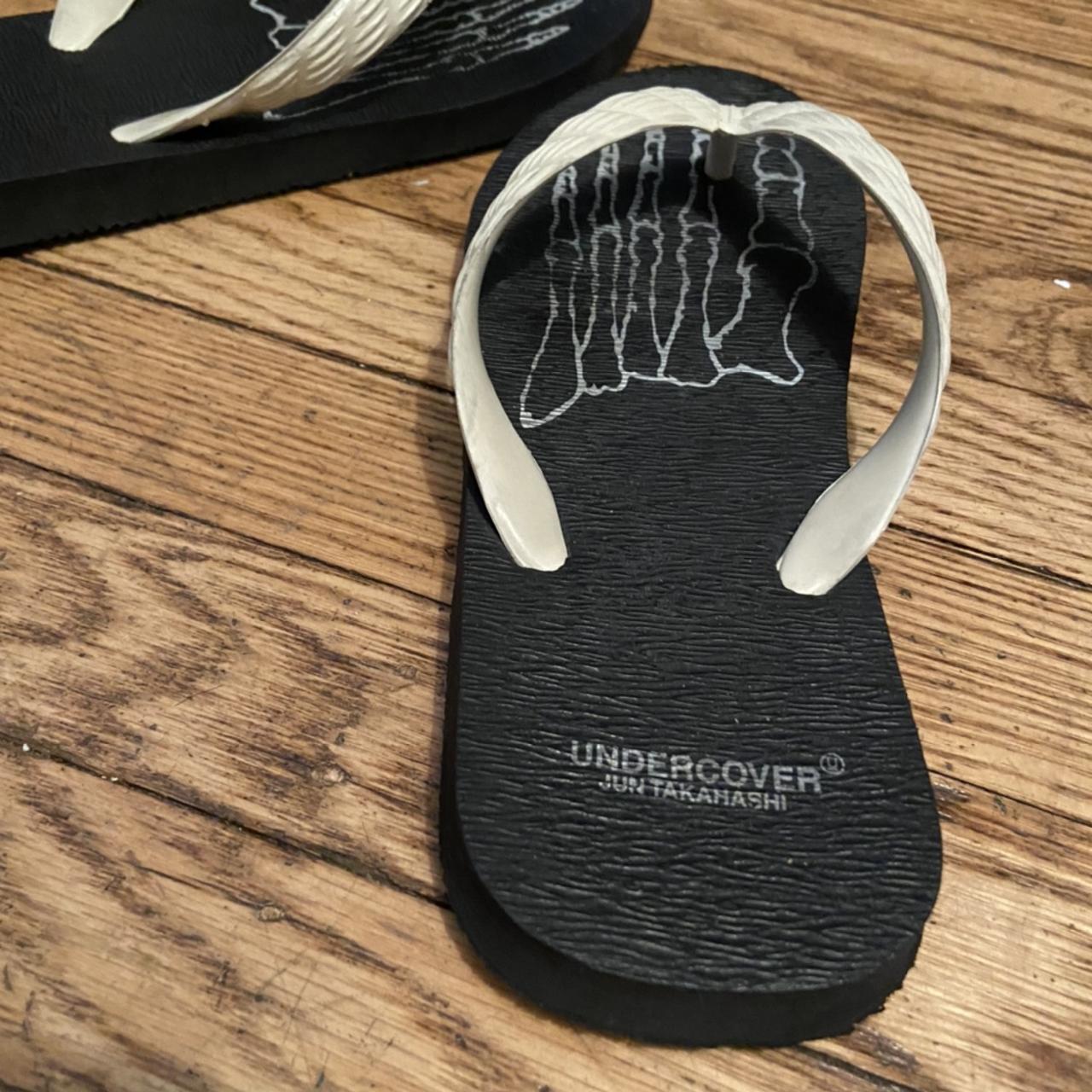 Undercover x Genbei bone print flip flops