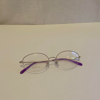 Courreges oval clear lens glasses with purple arms