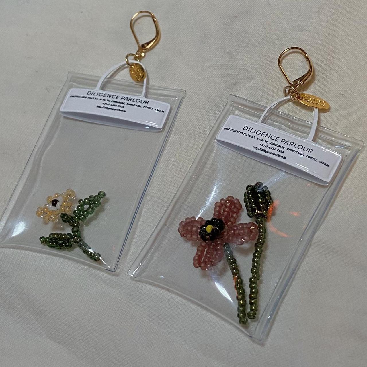 Theatre Products clear pouch beaded flowers earrings