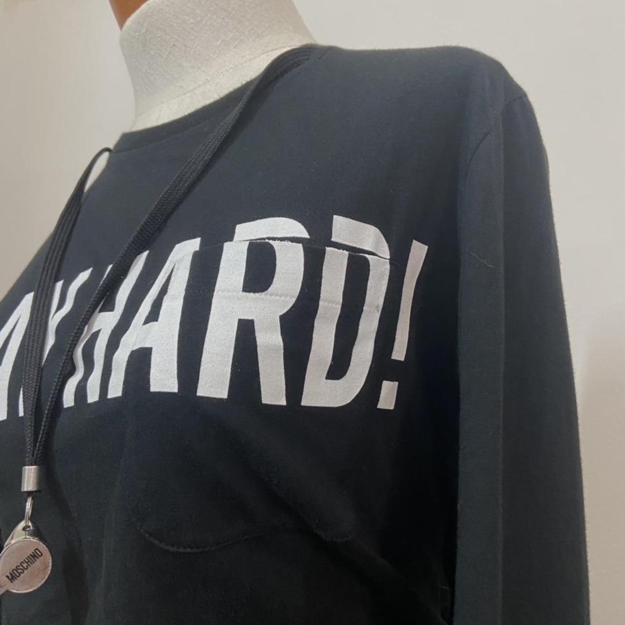 Moschino “Play Hard” longsleeve with working whistle necklace attachment