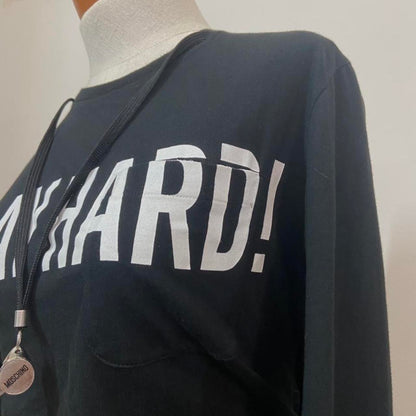 Moschino “Play Hard” longsleeve with working whistle necklace attachment