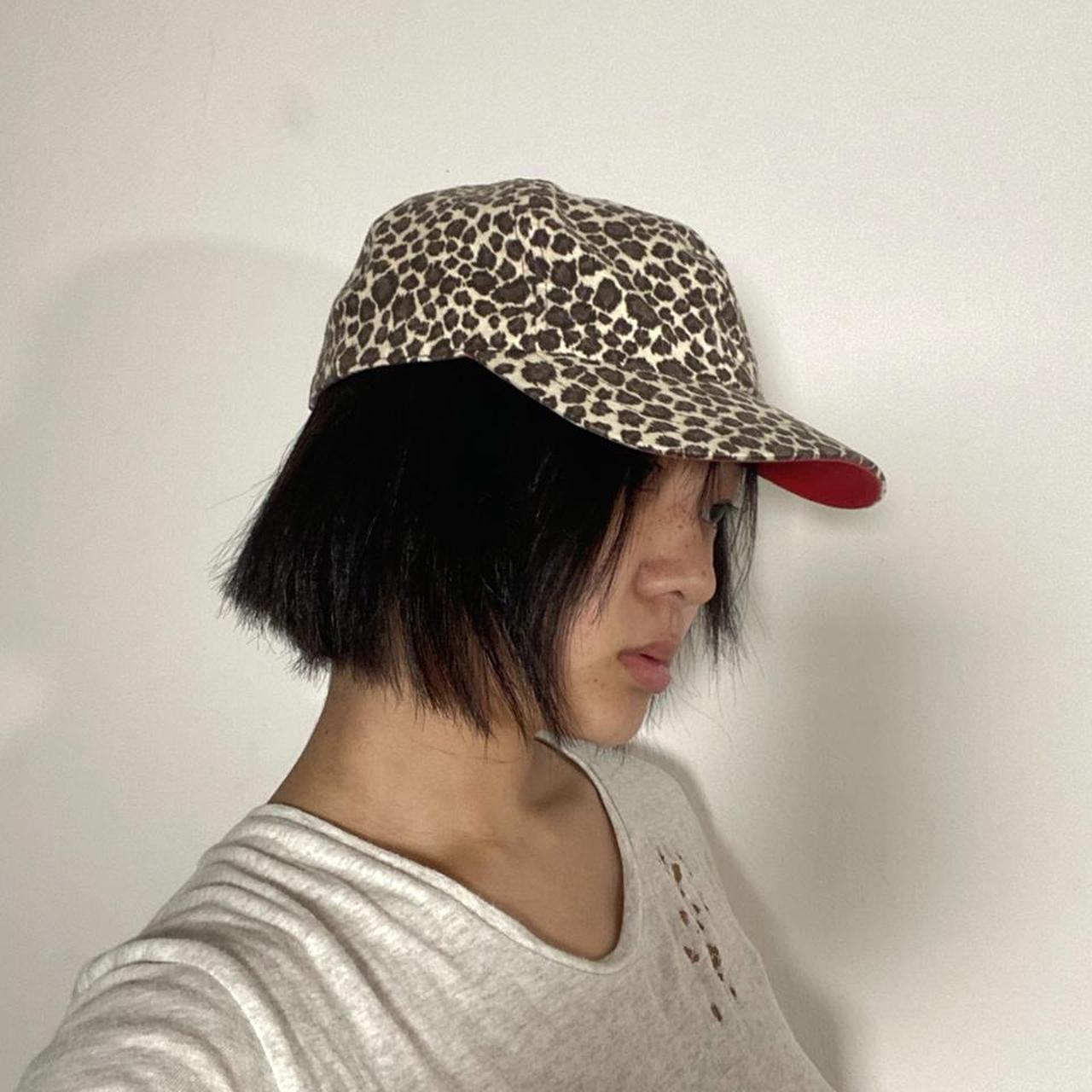 Undercover leopard print baseball cap with red inner