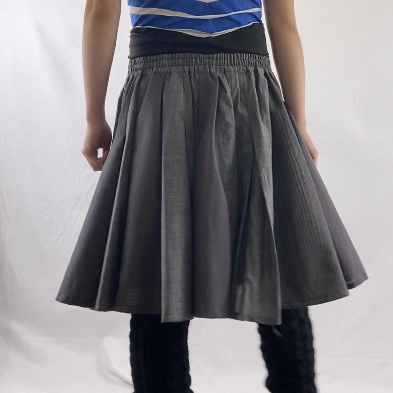 Gomme alternating linen and sport mesh panel pleated elastic skort