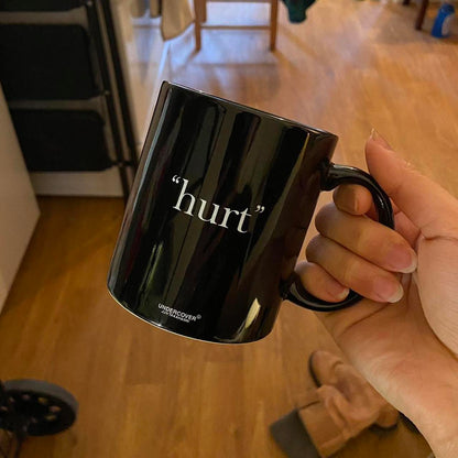 Undercover “Hurt” and “Evil Clown” black mugs