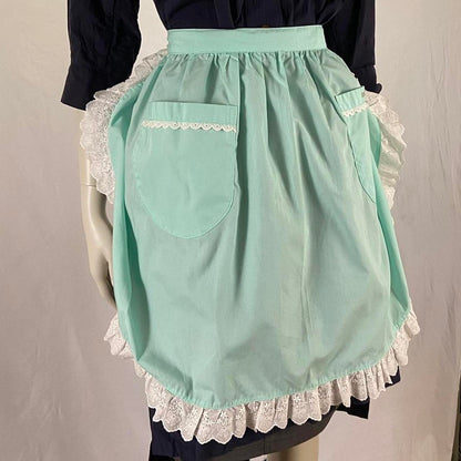 Courreges aqua blue tie-back apron with eyelet lace detail