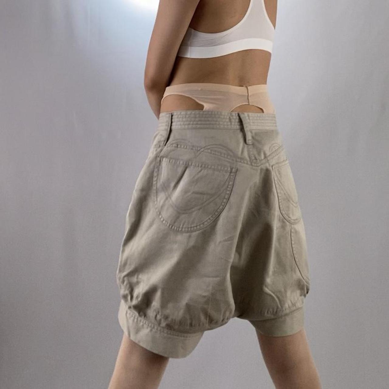 Tsumori Chisato heart butt-pocket oversized khaki slouch shorts