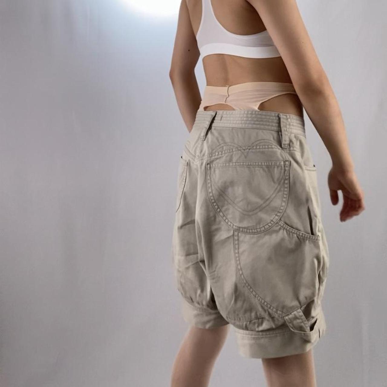 Tsumori Chisato heart butt-pocket oversized khaki slouch shorts