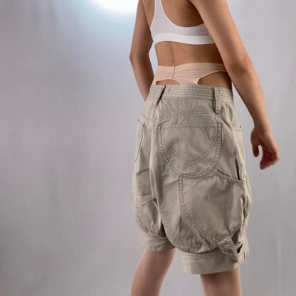 Tsumori Chisato heart butt-pocket oversized khaki slouch shorts