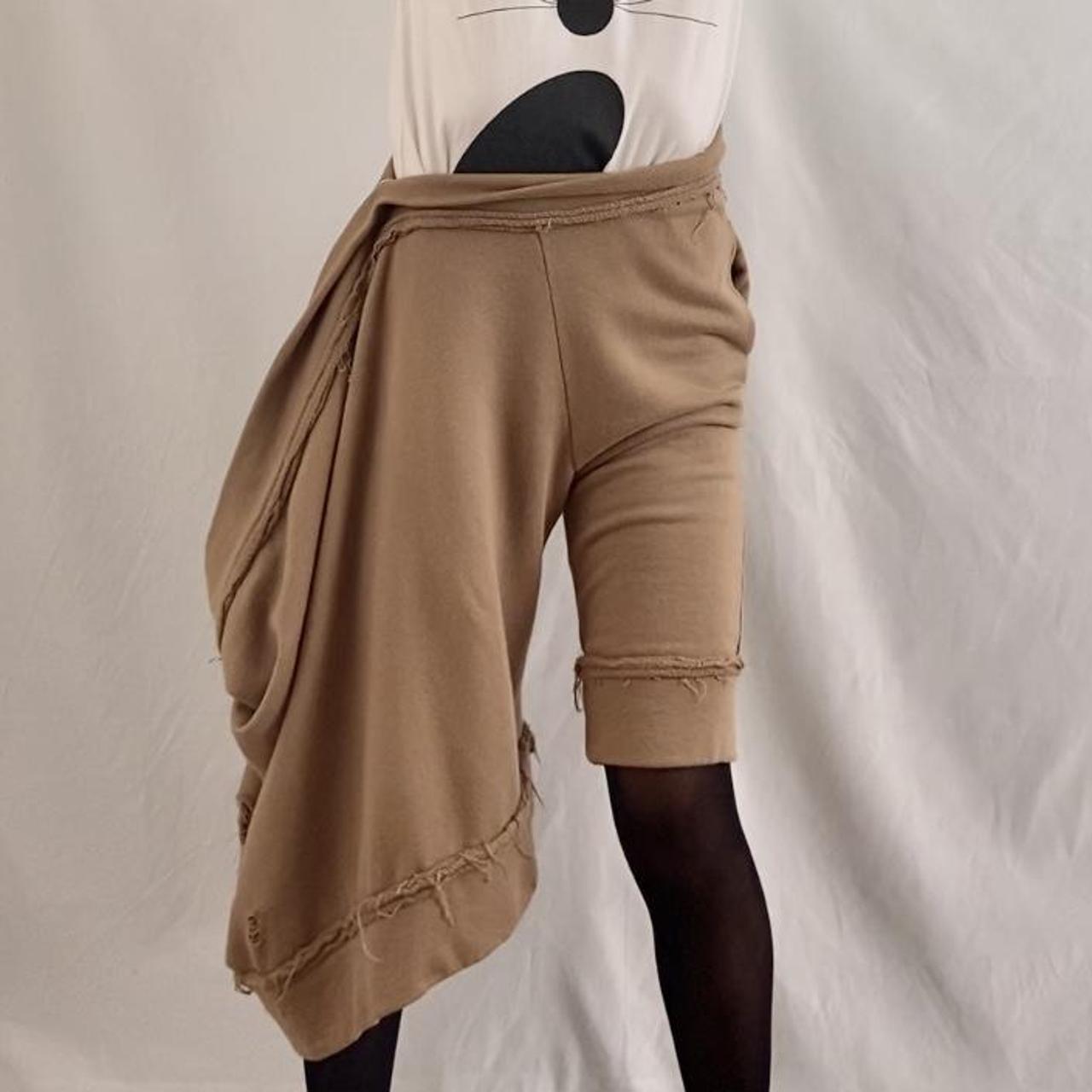 Limi Feu asymmetrical snap closure sweatpant shorts with distressing detail