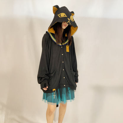 Favorite yellow and black cat hoodie with attached tail and paw print thumbhole sleeve detail