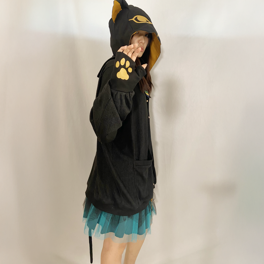 Favorite yellow and black cat hoodie with attached tail and paw print thumbhole sleeve detail